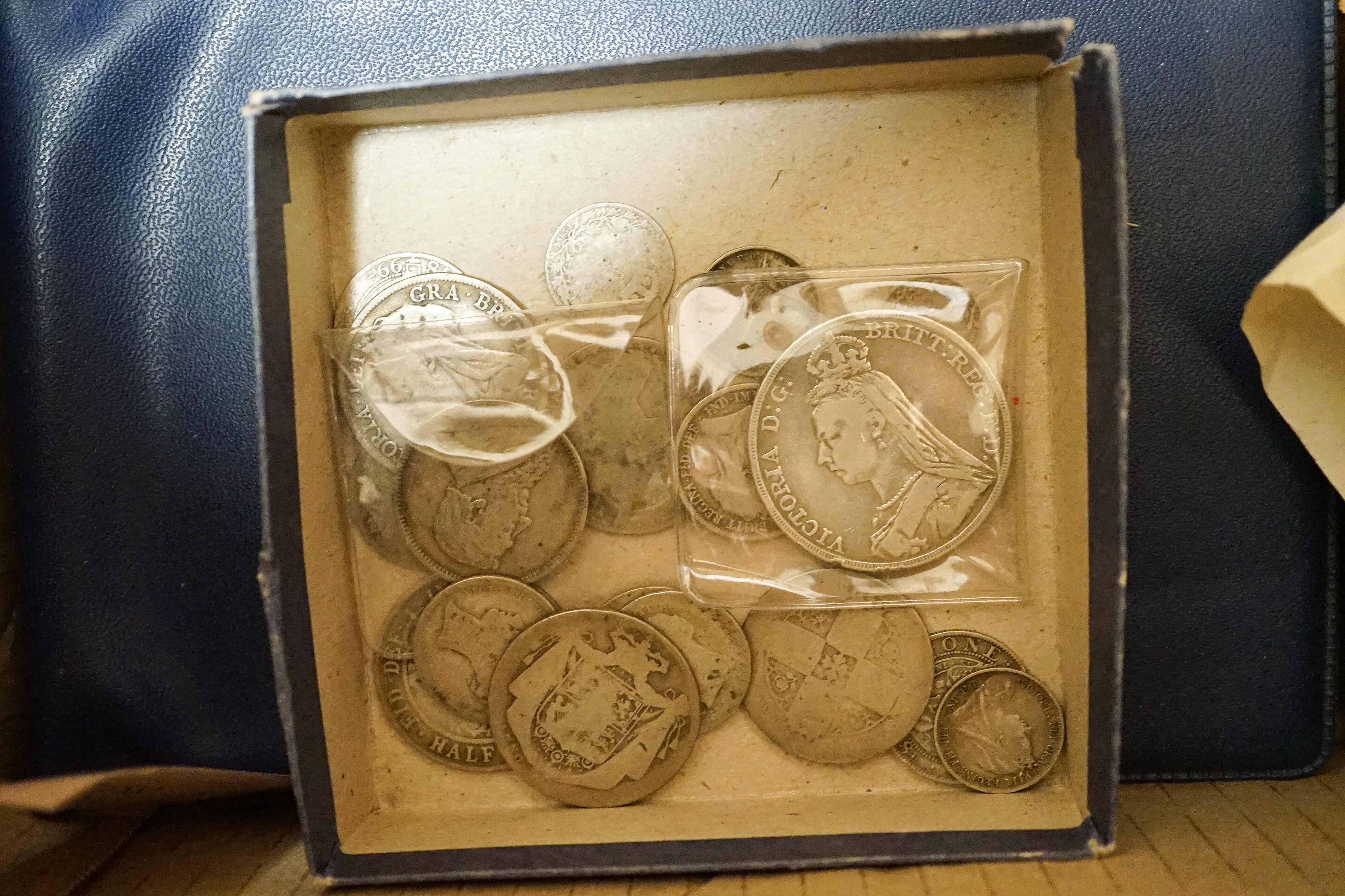 A group of 19th/20th century UK and World coins including florins and crowns